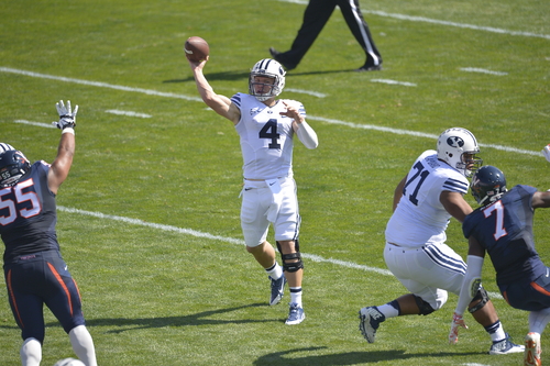 Chris Detrick  |  The Salt Lake Tribune
Brigham Young Cougars quarterback Taysom Hill (4) passe the ball during the game at LaVell Edwards Stadium Saturday September 20, 2014.  Virginia is winning the game 16-13 at halftime.