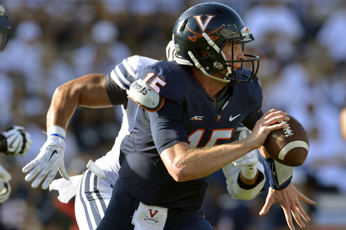 Chris Detrick  |  The Salt Lake Tribune
Virginia Cavaliers quarterback Matt Johns (15) looks to pass the ball during the second half of the game at LaVell Edwards Stadium Saturday September 20, 2014.  BYU won the game 41-33.