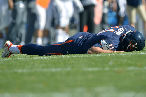 Chris Detrick  |  The Salt Lake Tribune
Virginia Cavaliers quarterback Greyson Lambert (11) remains on the ground during the second half of the game at LaVell Edwards Stadium Saturday September 20, 2014.  BYU won the game 41-33.