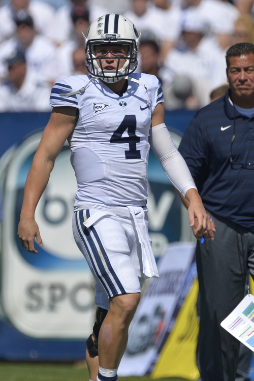 Chris Detrick  |  The Salt Lake Tribune
Brigham Young Cougars quarterback Taysom Hill (4) during the game at LaVell Edwards Stadium Saturday September 20, 2014.  Virginia is winning the game 16-13 at halftime.