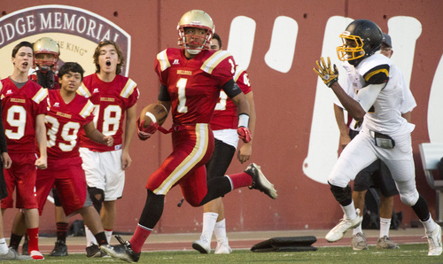 Rick Egan  |  The Salt Lake Tribune

The Judge bench cheers on Sport Falemaka (1), as Union's Everet Miller (10) chases him down, in prep football action, Judge Memorial vs. Union High School, at Judge Memorial, Friday, September 19, 2014