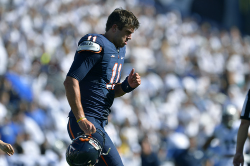 Chris Detrick  |  The Salt Lake Tribune
Virginia Cavaliers quarterback Greyson Lambert (11) runs off of the filled during the second half of the game at LaVell Edwards Stadium Saturday September 20, 2014.  BYU won the game 41-33.