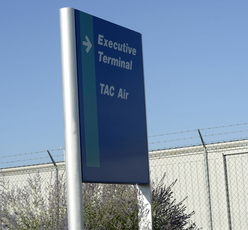 Al Hartmann  |  The Salt Lake Tribune
Sign for TAC Air near the Executive Terminal (east side) of the Salt Lake Airport.