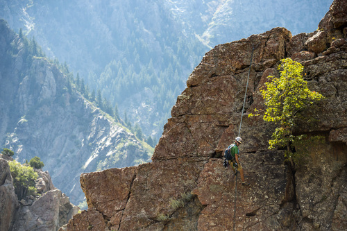 Chris Detrick  |  The Salt Lake Tribune
Utah Mountain Adventures guide Tyson Bradley rappels down a 5.4 rated route on Reservoir Ridge in Big Cottonwood Canyon Tuesday September 23, 2014.