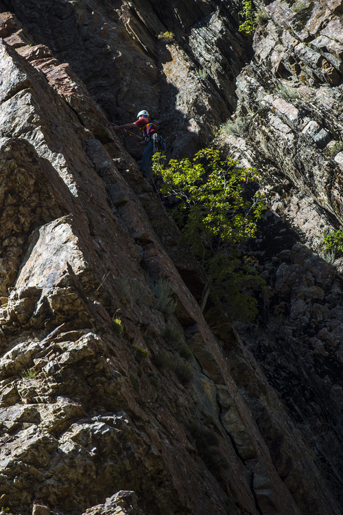 Chris Detrick  |  The Salt Lake Tribune
A man climbs a route on Reservoir Ridge in Big Cottonwood Canyon Tuesday September 23, 2014.