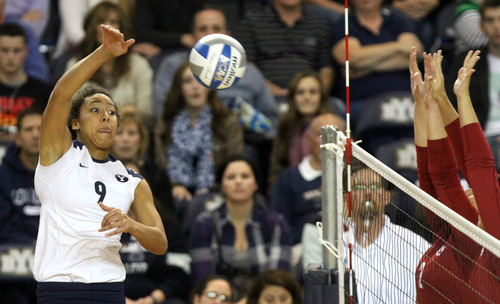 Rick Egan  | The Salt Lake Tribune 

Alexa Gray spikes the ball as BYU faced Oklahoma in NCAA  volleyball action at the Smith Fieldhouse in Provo, Saturday, December 1, 2012.