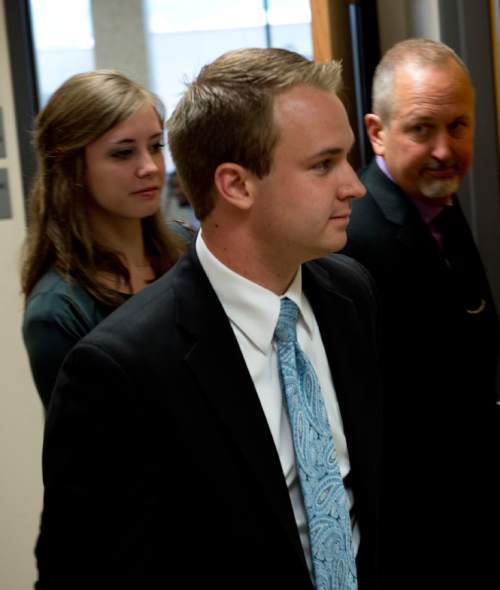 Jeremy Harmon  |  The Salt Lake Tribune

Nathan Fletcher leaves court after making his initial court appearance in Provo on Thursday, June 5, 2014. Fletcher is alleged to have sexually assaulted multiple women at BYU.