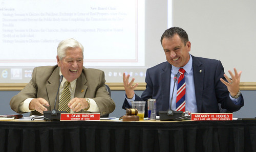 Leah Hogsten  |  The Salt Lake Tribune
The Utah Transit Authority Board outgoing chairman Greg Hughes and newly elected chairman H. David Burton, the former presiding bishop of the LDS Church, share a laugh during the UTA meeting September 24, 2014.