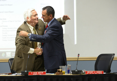 Leah Hogsten  |  The Salt Lake Tribune
The Utah Transit Authority Board outgoing chairman Greg Hughes hugs newly elected chairman H. David Burton, the former presiding bishop of the LDS Church, September 24, 2014.
