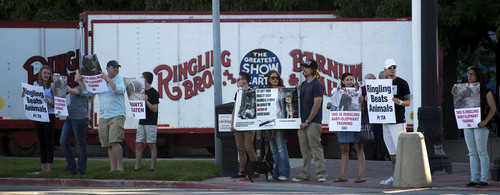 Steve Griffin  |  The Salt Lake Tribune

Protesters from Animal Defenders International and Utah Animal Rights Coalition stand outside EnergySolutions Arena during opening night of the Ringling Bros. and Barnum & Bailey Circus in Salt Lake City, Wednesday, September 24, 2014. The groups are calling on the local community to stay away from the circus, saying the industry involves cruelty and suffering to animals.