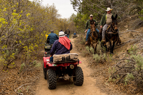 Trent Nelson  |  The Salt Lake Tribune
Mounted law enforcement officers move off the trail as motorized vehicles make their way through Recapture Canyon, which has been closed to motorized use since 2007. San Juan County Commissioner Phil Lyman is among five Utahns charged Wednesday with conspiracy in connection with a May 10 ATV ride into Recapture Canyon protesting federal oversight of public land. The BLM had closed this canyon outside Blanding to protect its archaeological resources from motorized use. About 50 people rode into the canyon that day, but only those suspected of organizing or promoting the event were charged.