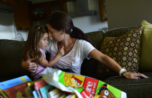 Scott Sommerdorf   |  The Salt Lake Tribune
Alethia Chatzis says that instead of time outs or spanking, she takes her child out of the situation causing the problem, and has a talk with them on the couch, as she is doing here with her 4-year-old daughter Sophia, Wednesday, September 24, 2014.