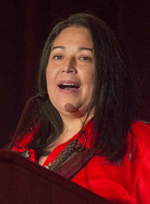 Rick Egan  |  The Salt Lake Tribune

Jacqueline Gomez-Arias speaks to the udience after receiving the Outstanding  Achievement Award for Human Service, during the 26th Annual YWCA LeaderLuncheon event at the Grande America, Friday, September 26, 2014.