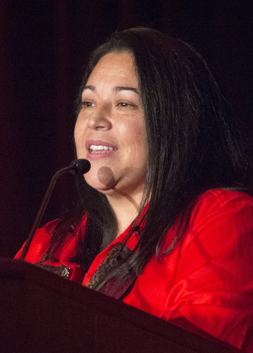 Rick Egan  |  The Salt Lake Tribune
Jacqueline Gomez-Arias speaks to the udience after receiving the Outstanding  Achievement Award for Human Service, during the 26th Annual YWCA LeaderLuncheon event at the Grande America, Friday, September 26, 2014.