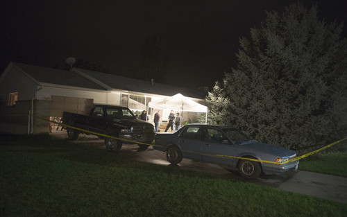 Rick Egan  |  The Salt Lake Tribune

Springville Police investigate the scene where 5 people were found dead in their home in Springville, Saturday, September 27, 2014.