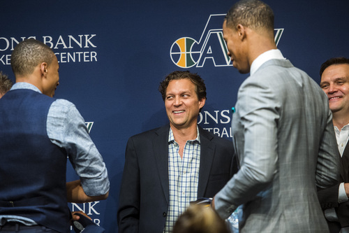 Chris Detrick  |  The Salt Lake Tribune
Utah Jazz coach Quin Snyder talks with Dante Exum and Rodney Hood during a press conference at the Zions Bank Basketball Center Friday June 27, 2014.