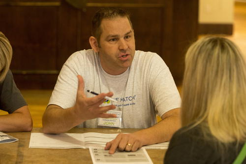 Rick Egan  |  The Salt Lake Tribune

John Philpott interviews Melanie Kenyon, during the "Be The Match" bone marrow donor registration drive at The Gateway, Saturday, September 27, 2014.   Folks registered as bone marrow donors and gave cheek swabs for DNA matching purposes.