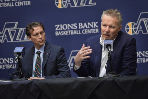 Scott Sommerdorf   |  The Salt Lake Tribune
Quin Snyder listens at left as Jazz CEO Greg Miller talks about details of the hiring process. The Utah Jazz introduced Quin Snyder as their new head coach, Saturday, June 7, 2014.