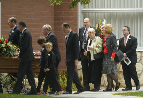 Leah Hogsten  |  The Salt Lake Tribune
Grethe Peterson, her children Erika, Stuart, and Edward, spouses, grandchildren, extended family and friends follow the casket of Dr. Chase Nebeker Peterson, physician, educator and University of Utah's 14th president who died on September 14, 2014 in Salt Lake City at the age of 84. Funeral services took place at Monument Park North Stake Center, Saturday, September 27, 2014.