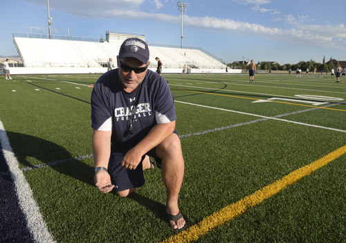 Al Hartmann  |  The Salt Lake Tribune 
Corner Canyon High School football coach Donald Eck likes the new articial turf on the school's football field.