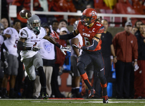 Scott Sommerdorf   |  The Salt Lake Tribune
This pass from Travis Wilson slipped through the hands of Utah WR Dres Anderson when it looked like he would have scored late in teh game vs Washington State. Utah lost 28-27 to Washington State, Saturday, September 27, 2014.
