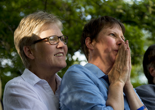 Steve Griffin  |  Tribune file photo

Plaintiffs Laurie Wood and Kody Partridge listen to speakers as they join Utah Unites for Marriage at City Creek Park in Salt Lake City Wednesday, June 25, 2014, to celebrate the historic decision in Kitchen v. Herbert and stepping-stone toward the freedom to marry.