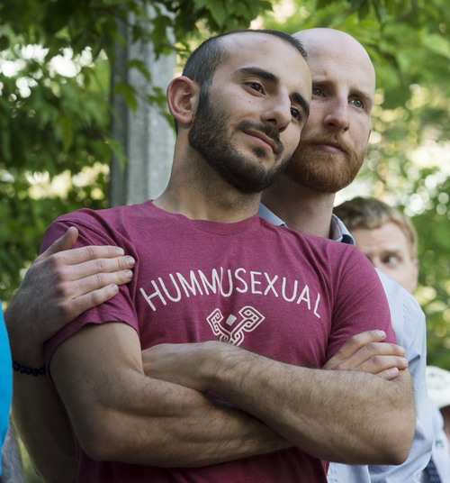 Steve Griffin  |  Tribune file photo

Plaintiffs Moudi Sbeity and Derek Kitchen listen to speakers as they joined Utah Unites for Marriage at City Creek Park in Salt Lake City Wednesday, June 25, 2014, to celebrate the historic decision in Kitchen v. Herbert and stepping-stone toward the freedom to marry.