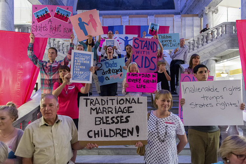 Trent Nelson  |  Tribune file photo
Traditional marriage supporters filled the Capitol Rotunda during a rally in Salt Lake City, Thursday September 18, 2014.