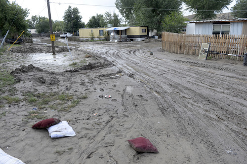 Al Hartmann  |  The Salt Lake Tribune
On Monday Sept. 29, 2014, parts of the Pilling Trailer Park in Carbonville near Price are mostly empty with many trailers unlivable from the flooding caused by the Price River overflowing its banks Saturday night. On Sunday most people at the park dug out what they could and removed belongings.