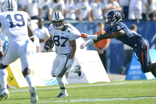 Chris Detrick  |  The Salt Lake Tribune
Brigham Young Cougars wide receiver Mitchell Juergens (87) runs rom Virginia Cavaliers safety Anthony Harris (8) during the second half of the game at LaVell Edwards Stadium Saturday September 20, 2014.  BYU won the game 41-33.