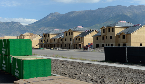Francisco Kjolseth  |  The Salt Lake Tribune
Work began this summer on three high-density housing clusters in the @geneva development, a 1,700 acre master-planned  project being built on the site of the old Geneva Steel Mill, at Vineyard in Utah County. Sandy-based Anderson Development, which bought the abandoned mill site in 2005 for $46.8 million, predicts the blend of residential, commercial and industrial buildings will be worth upward of $3.2 billion.