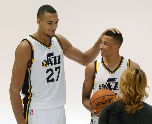 Steve Griffin  |  The Salt Lake Tribune


Rudy Gobert puts his hand on rookie Dante Exum as they prepare to be photographed during Jazz Media Day at the Zions Bank Basketball Center in Salt Lake City, Monday, September 29, 2014.