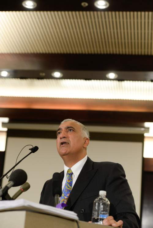 Francisco Kjolseth  |  The Salt Lake Tribune
District Attorney Sim Gill holds a press conference at the Salt Lake County Offices as he describes in detail how events unfolded while announcing that the officer involved in the shooting of Dillon Taylor on Aug. 11, 2014, was legally justified. The use of deadly force by Salt Lake Police Officer Cruz was justified after a lengthy investigation with the assistance of a camera used by the officer at the time of the shooting.