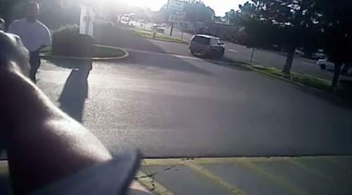 A screen shot from the officer camera video of Officer Bron Cruz pointing his gun at Dillon Taylor just moments before Cruz shot Taylor on Aug. 11, 2014.