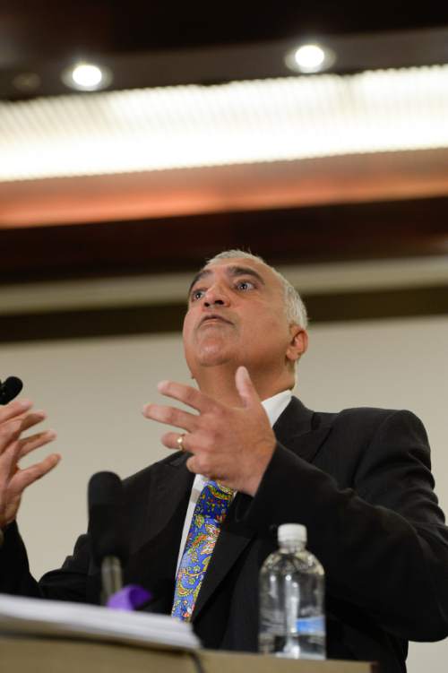 Francisco Kjolseth  |  The Salt Lake Tribune
District Attorney Sim Gill holds a press conference at the Salt Lake County Offices as he describes in detail how events unfolded while announcing that the officer-involved shooting of Dillon Taylor on Aug. 11, 2014, was legally justified. The use of deadly force by Salt Lake Police Officer Bron Cruz was justified after a lengthy investigation with the assistance of a body camera worn by the officer at the time of the shooting.