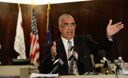 Francisco Kjolseth  |  The Salt Lake Tribune
District Attorney Sim Gill holds a press conference at the Salt Lake County Offices as he describes in detail how events unfolded while announcing that the officer involved in the shooting of Dillon Taylor on Aug. 11, 2014, was legally justified. The use of deadly force by Salt Lake Police Officer Cruz was justified after a lengthy investigation with the assistance of a camera used by the officer at the time of the shooting.