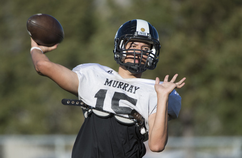 Rick Egan  |  The Salt Lake Tribune

Murray quarter backDrew Cash (15) throws a pass during the Murray High football practice, Wednesday, September 24, 2014