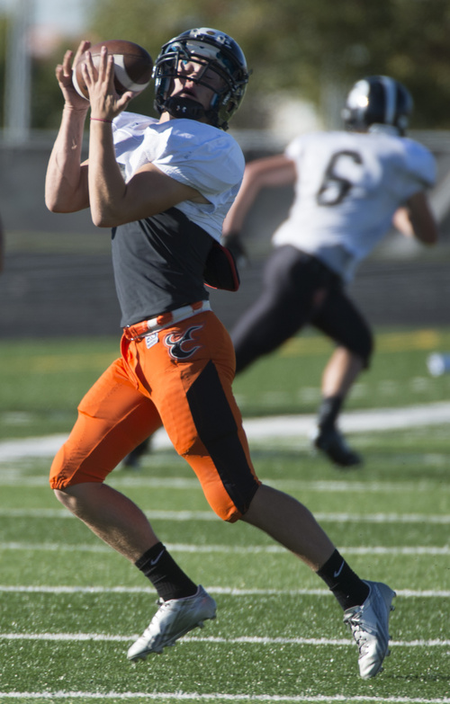 Rick Egan  |  The Salt Lake Tribune

Wide receiver Riley Richmond (2) grabs a pass during practice with the Murray High football team, Wednesday, September 24, 2014