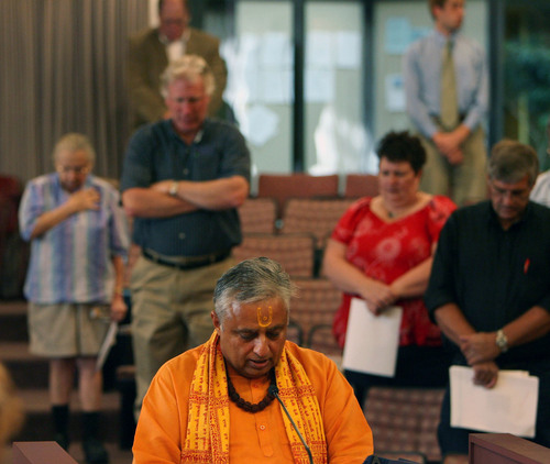Steve Griffin  |  The Salt Lake Tribune

Rajan Zed, president of the Universal Society of Hinduism, gives what is believed to be the first Hindu prayer ever to open a Salt Lake County Council meeting at the Salt Lake County Government Center in Salt Lake City, Utah Tuesday, September 20, 2011.