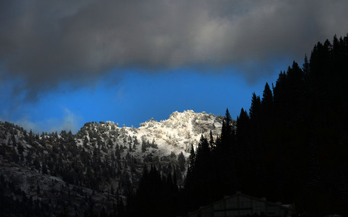 Steve Griffin  |  The Salt Lake Tribune

A snow-covered peak above Alta catches the evening sun Wednesday, October 1, 2014.
