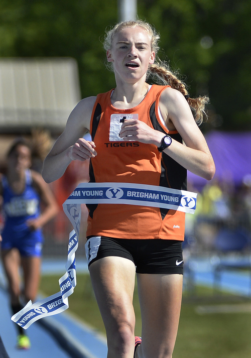 Scott Sommerdorf   |  The Salt Lake Tribune
Sarah Feeny of Ogden sets a state record in winning the 4A Girl's 3200 meters with a time of 10:13.86, beating the two year old record by 8 seconds, Saturday, May 17, 2014.