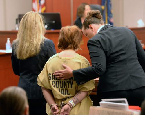 Al Hartmann  |  The Salt Lake Tribune
Alicia Englert, accused of throwing her baby in the trash earlier this month, makes her initial appearance in Judge Ann Boyden's courtroom in Salt Lake City Wednesday Septmeber 10.  Her defense lawyers Susanne Gustin, left, Melissa Fulkerson, right. She is charged with attempted murder.