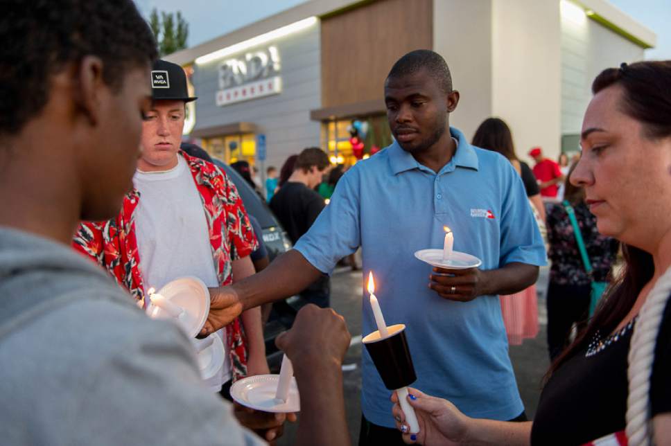 Trent Nelson  |  The Salt Lake Tribune
Candles are lit at a candlelight vigil Sunday September 14, 2014 for Darrien Hunt, who was shot and killed by Saratoga Springs police.