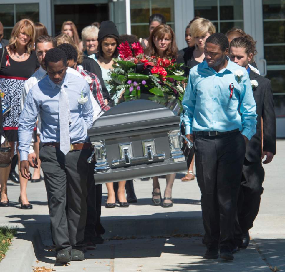 Steve Griffin  |  The Salt Lake Tribune


Family and friends serve as pallbearers as they carry the casket of Darrien Hunt following funeral services at the Saratoga Springs North Stake Center in in Saratoga Springs, Utah Thursday, September 18, 2014. Police officers in Saratoga Springs shot and killed Hunt on Sept. 10, 2014.