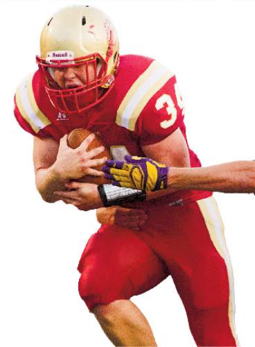 Rick Egan  |  The Salt Lake Tribune

Max Barnett (34) as he runs for Judge Memorial, in prep football action Judge Memorial vs. Union High School, at Judge Memorial, Friday, September 19, 2014