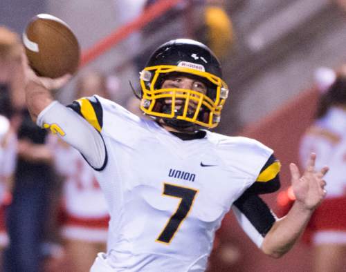 Rick Egan  |  The Salt Lake Tribune

Zach Roll throws the ball for the Cougars,  in prep football action Judge Memorial vs. Union High School, at Judge Memorial, Friday, September 19, 2014