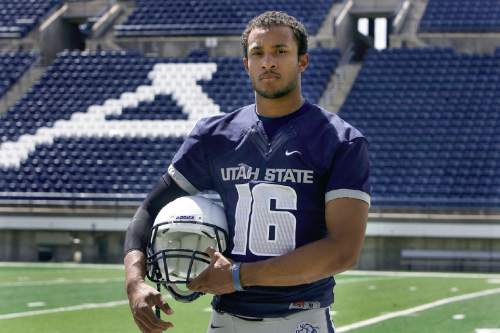 Scott Sommerdorf   |  The Salt Lake Tribune
QB Chuckie Keeton at Romney Stadium in Logan, Thursday, August 1, 2013.