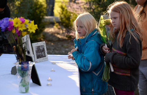 Francisco Kjolseth  |  The Salt Lake Tribune
Ashlyn Younkin, 8, left, and her sister Annika, 10, who was friends one of the girls who recently died, attend a vigil for the Strack family at Pioneer Park in Provo after the family of five were mysteriously found dead in their Springville home last Saturday. A Springville Police news release identified them Sunday as Benjamin Strack, 37, his wife, Kristi Strack, 36, two of their sons -- Benson Strack, 14, and Zion Strack, 11 -- and their daughter Emery Strack, 12. Preliminary autopsies ruled out any sort of violent assault, according to the release.