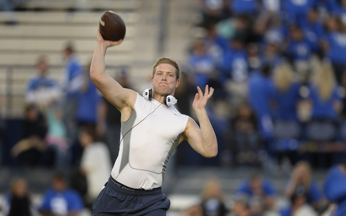 Scott Sommerdorf  |  The Salt Lake Tribune
BYU QB Taysom Hill throws during pre game warmups before BYU plays Utah State in Provo, Friday, October 1, 2014.