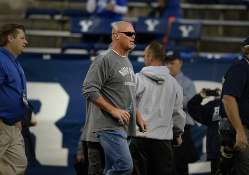 Scott Sommerdorf  |  The Salt Lake Tribune
Former BYU QB and NFL QB Jim McMahon arrives on the field during pre game warmups before BYU plays Utah State in Provo, Friday, October 1, 2014. He will be honored at halftime.